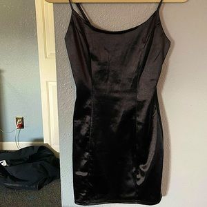 Little form fitting black dress